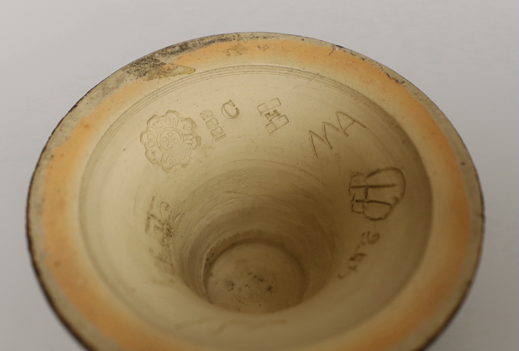 A Hannah Barlow Doulton Lambeth stoneware vase, decorated with horses, stamped and numbered 1883 to the base, 27cm high
